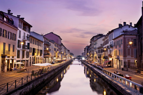 ITALY MILAN Milan, Naviglio Grande at dusk The Naviglio Grande is a canal in Lombardy, northern Italy, joining the Ticino river near Tornavento to the Porta Ticinese dock, also known as the Darsena, in Milan
